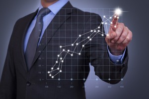 Businessman Touch Graph on Visual Screen